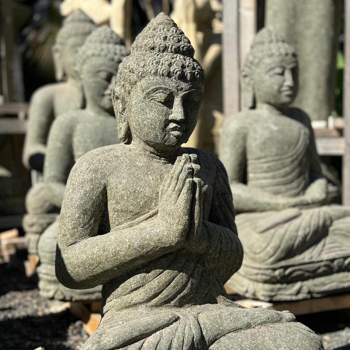 Carved Volcanic Rock Respect Praying Budha Statue – Unique Imports